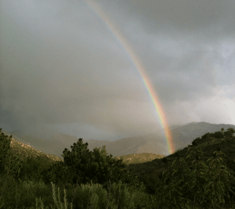 Rainbow over Blue Sky