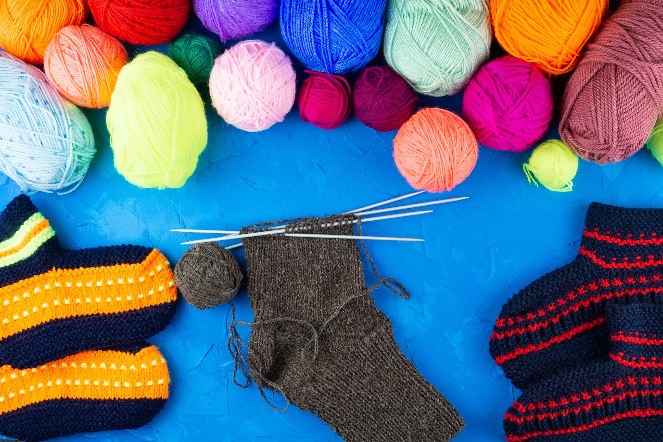 Socks, yarn, and knitting needles